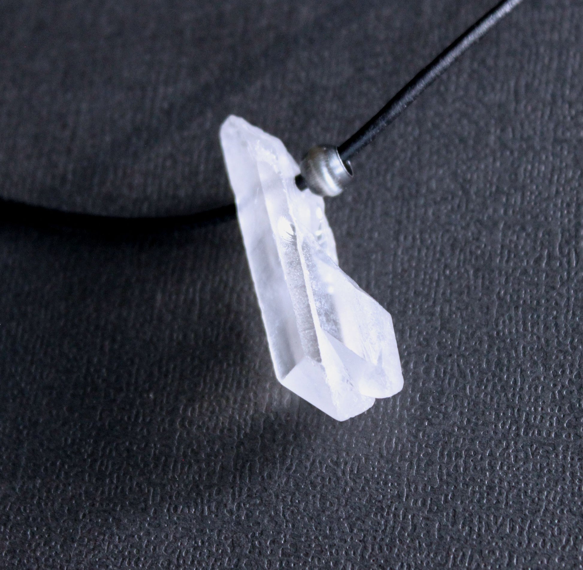 clear crystal quartz on leather cord