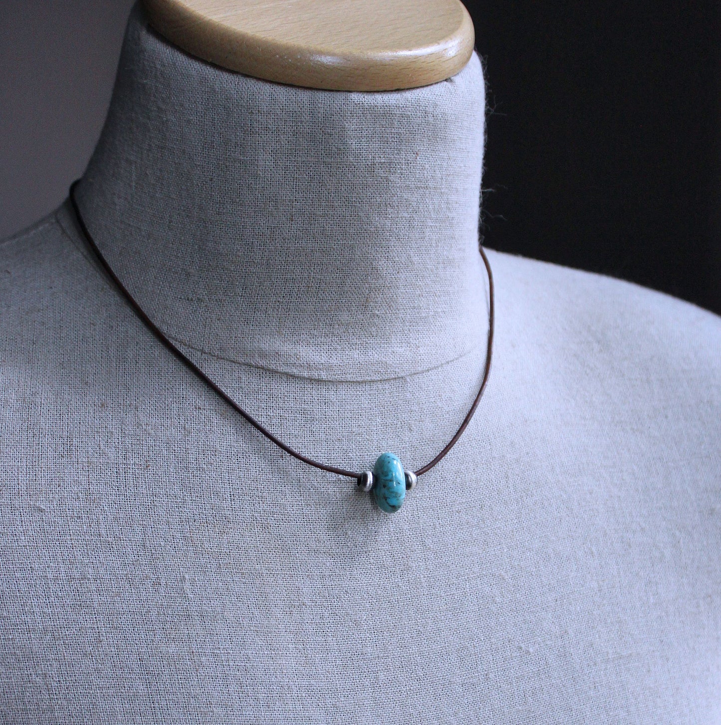 men's large turquoise bead on leather cord