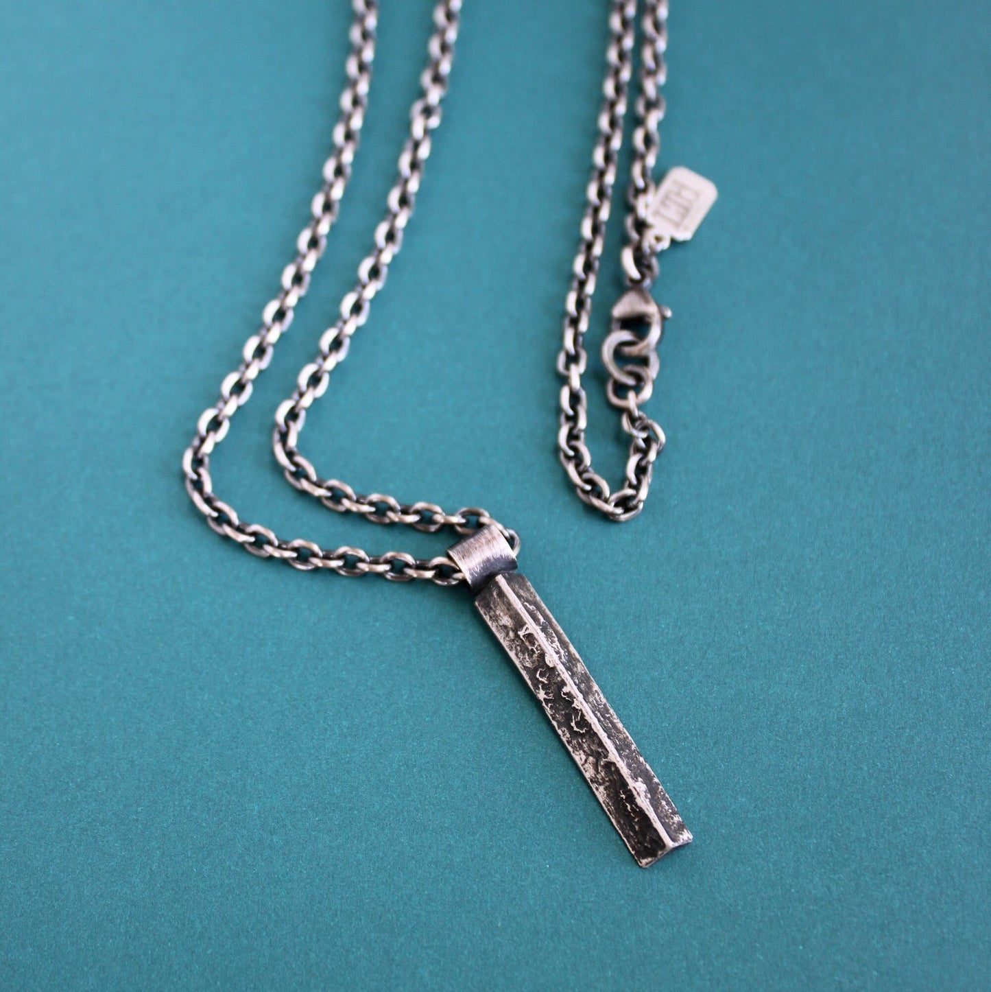 Men's Rugged Silver Long Pendant