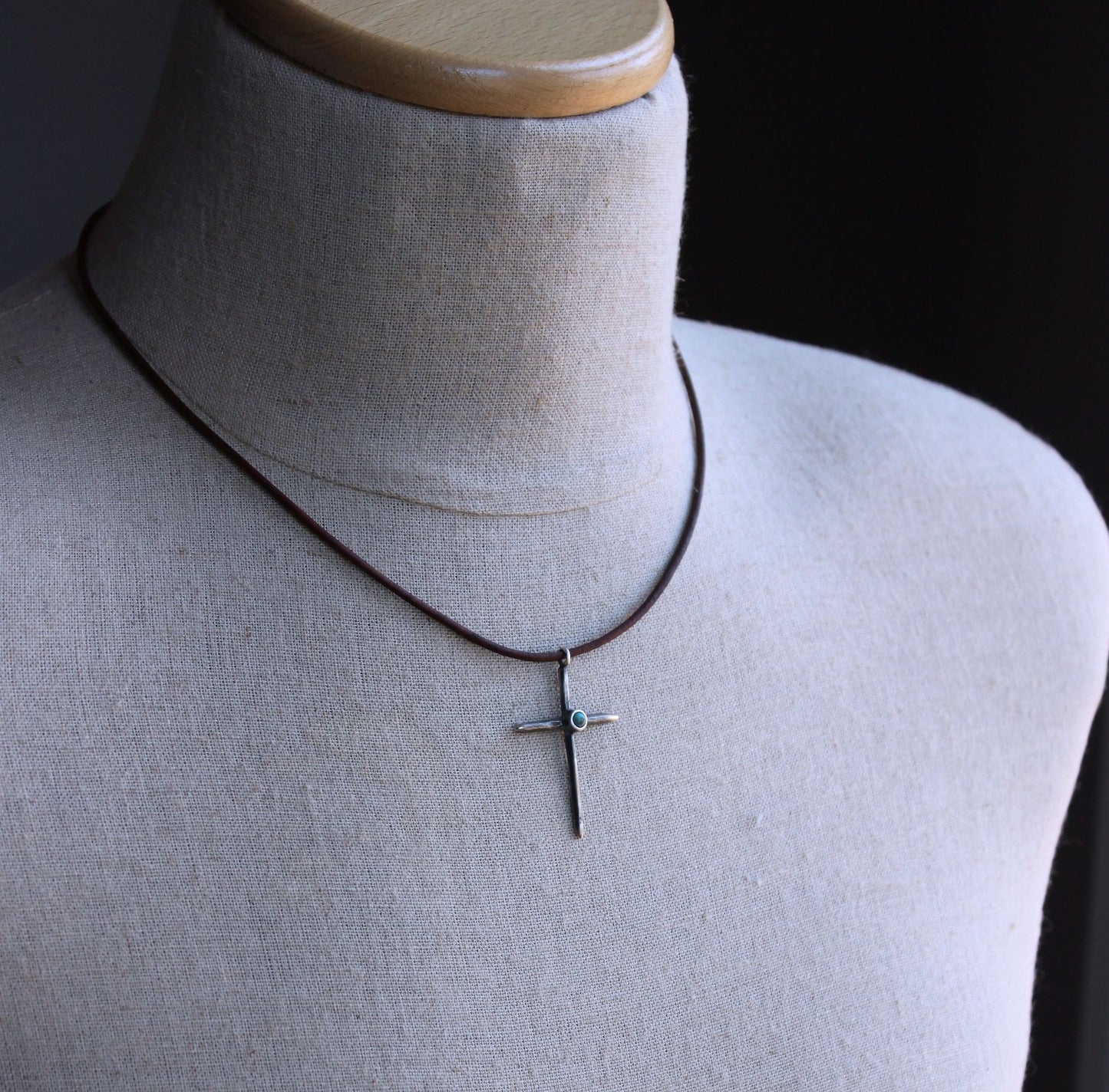 men's silver cross on leather cord