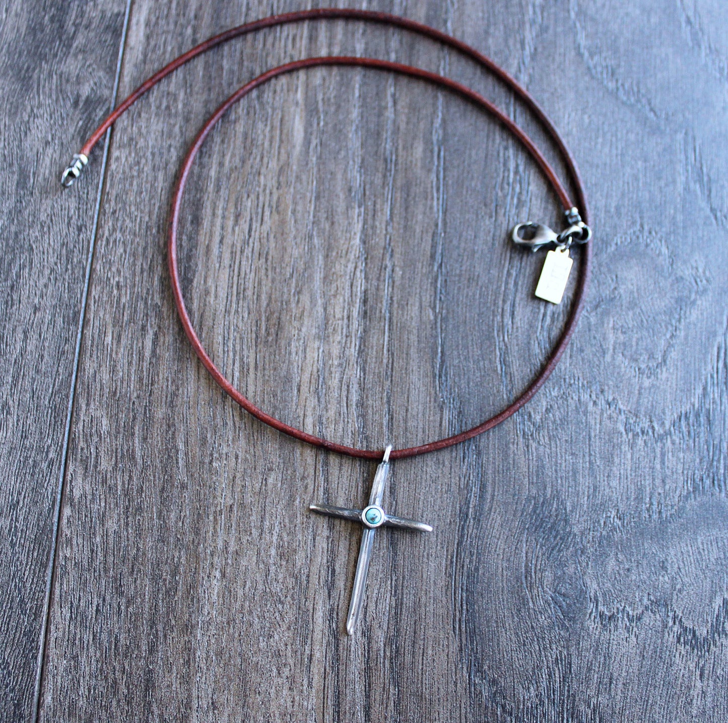 leather necklace with cross pendant