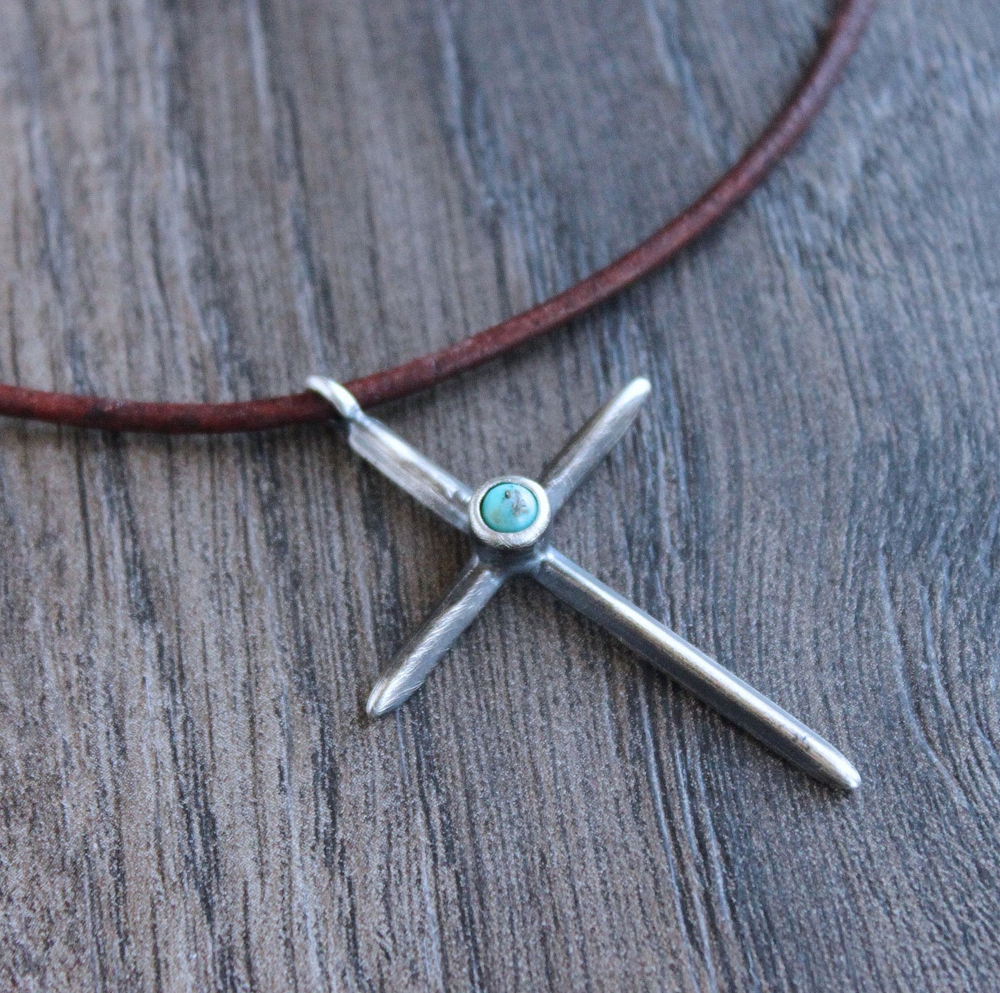 rustic cross pendant with turquoise stone