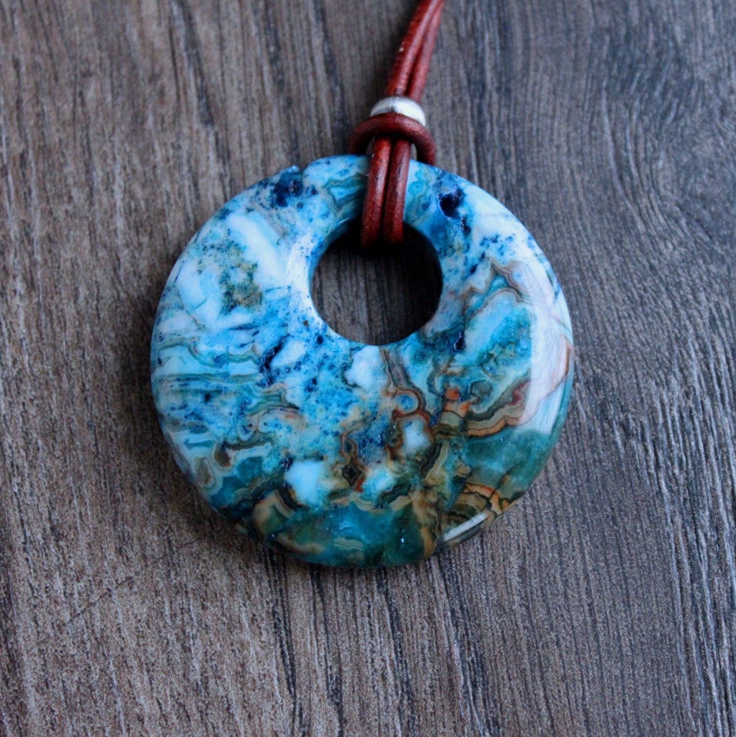 blue crazy lace agate pendant on leather cord