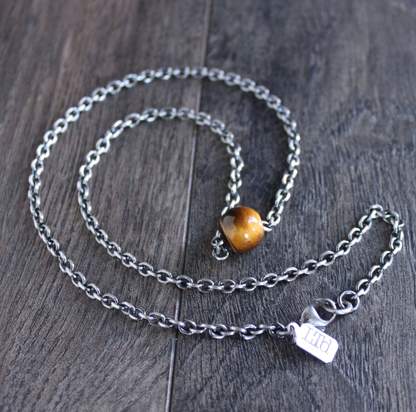 sterling silver chain with tiger's eye bead