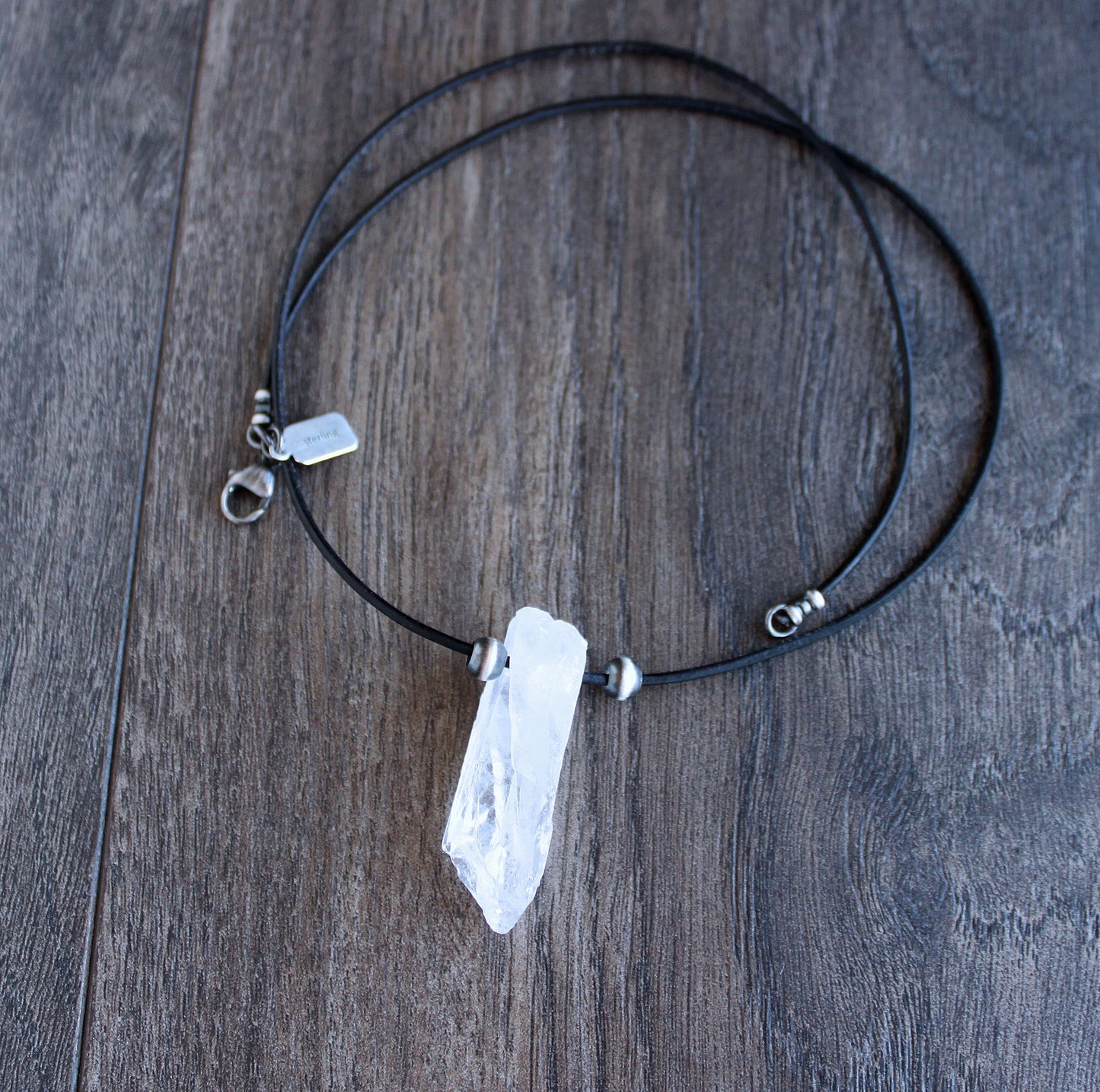 men's leather cord necklace with long crystal quartz pendant