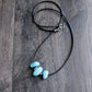 Three turquoise bead leather cord necklace