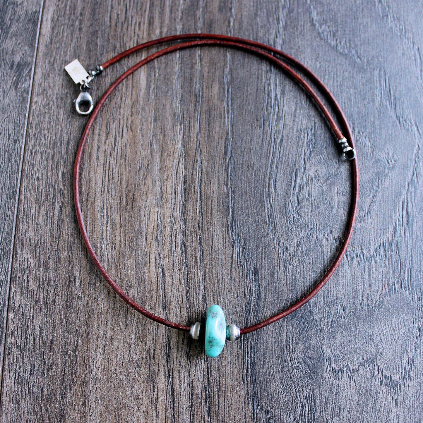 Men's leather necklace with large turquoise stone