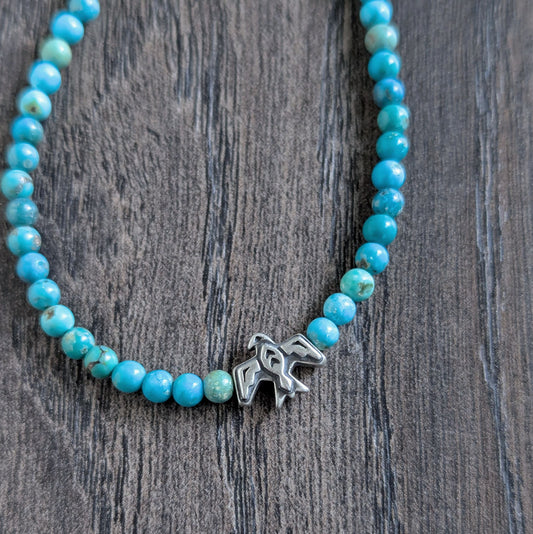 small silver thunderbird bead necklace
