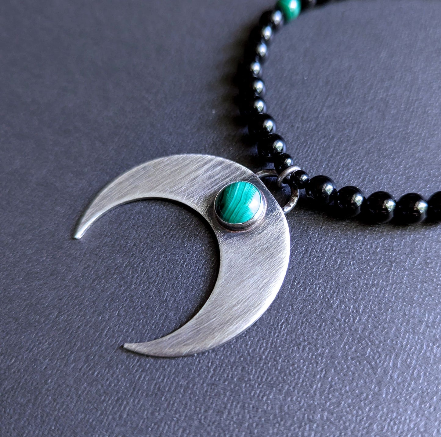 large crescent pendant with malachite stone necklace