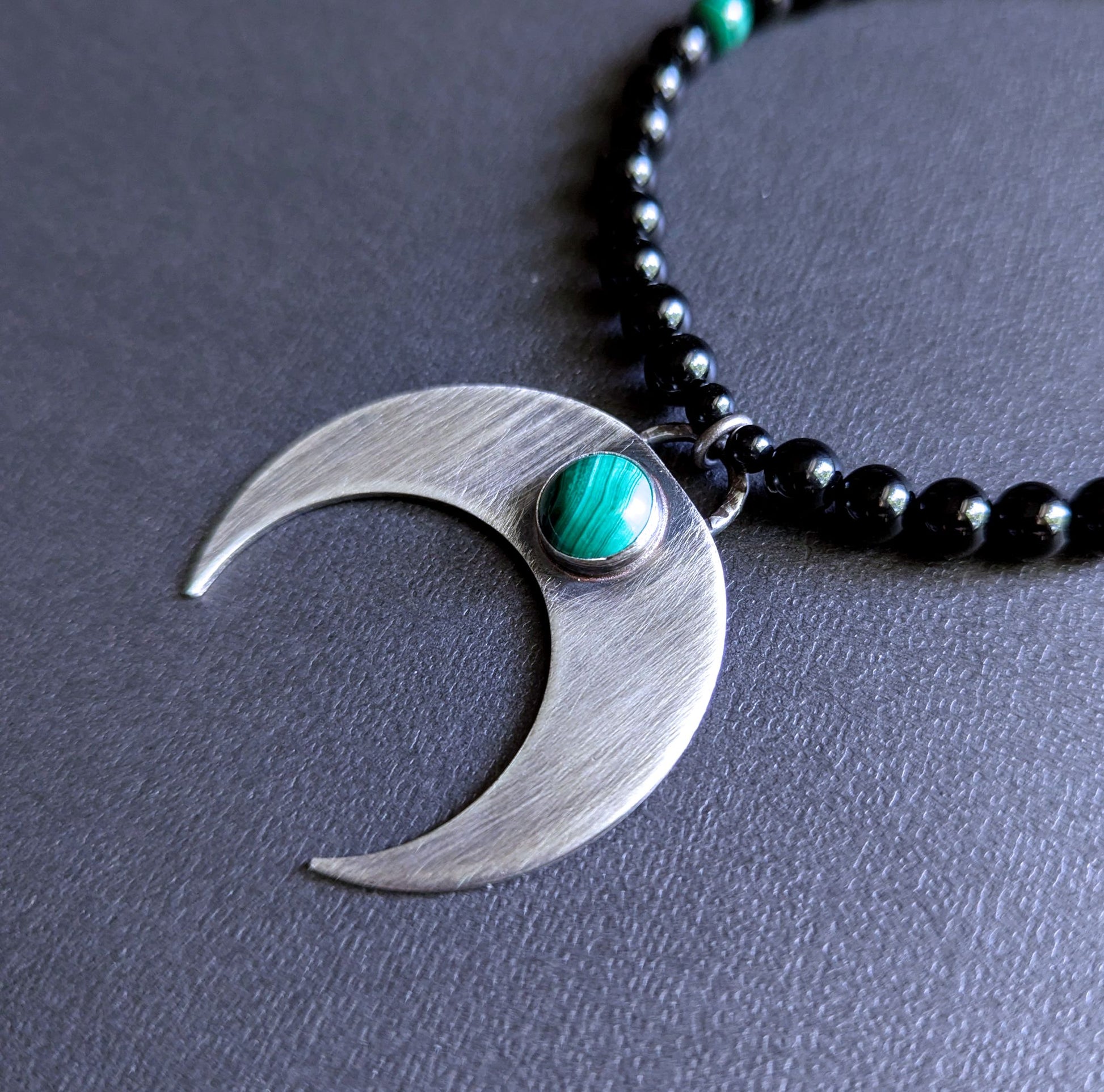 large crescent pendant with malachite stone necklace
