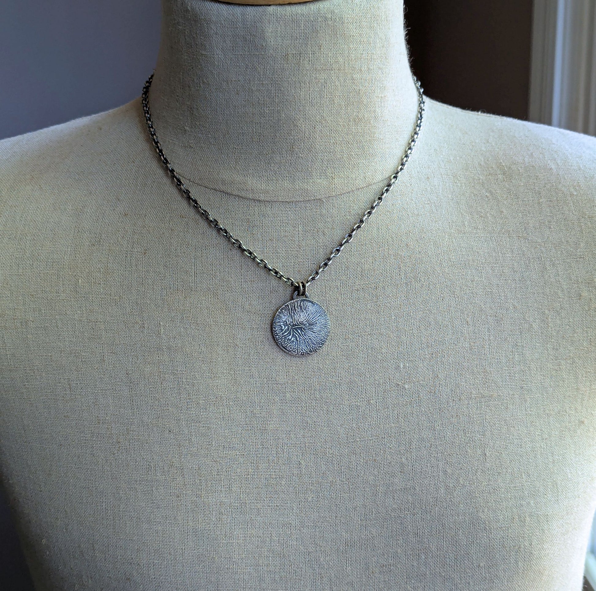men's silver textured disc pendant on chain