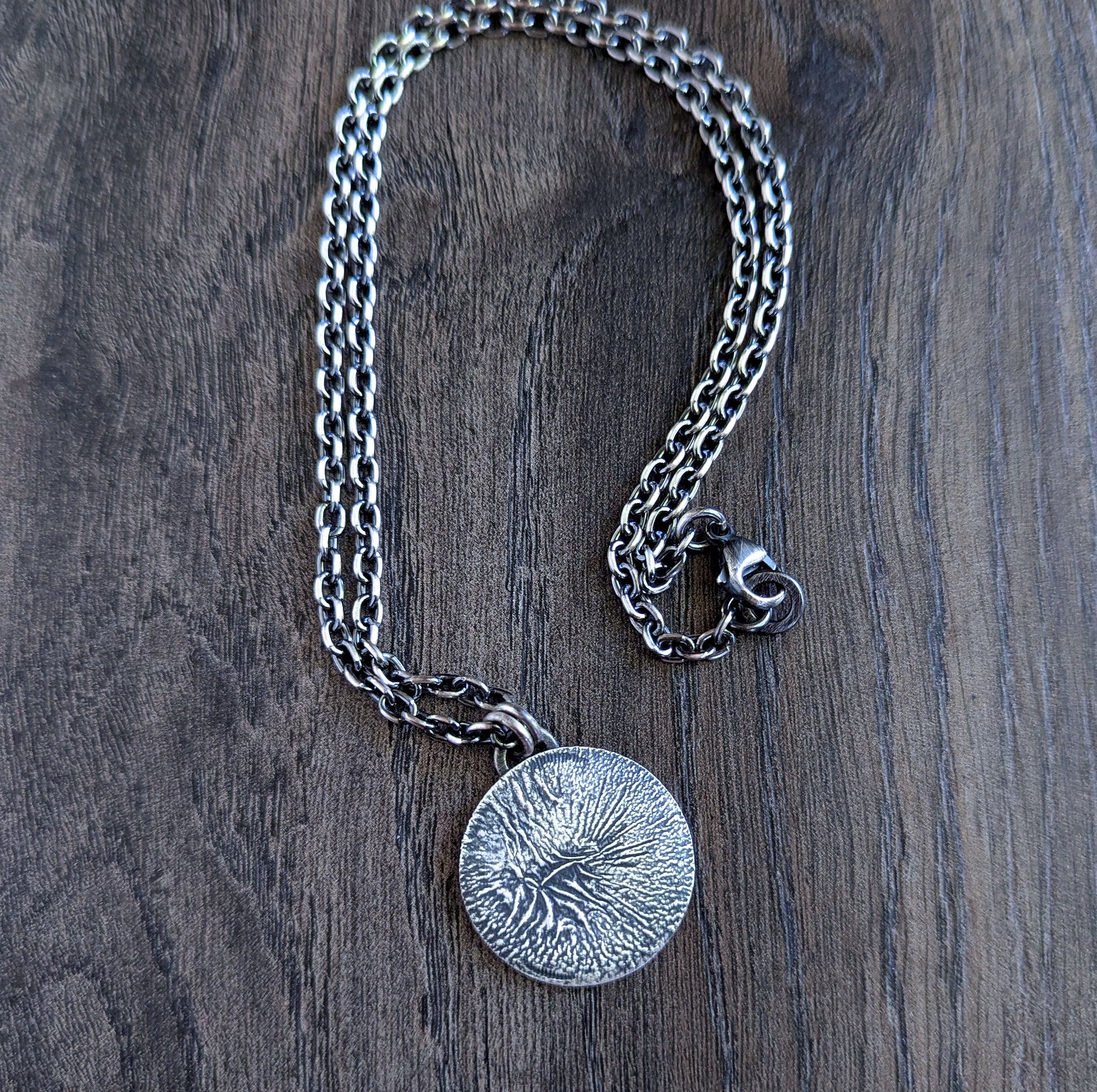 Men's rustic sterling silver round textured pendant necklace