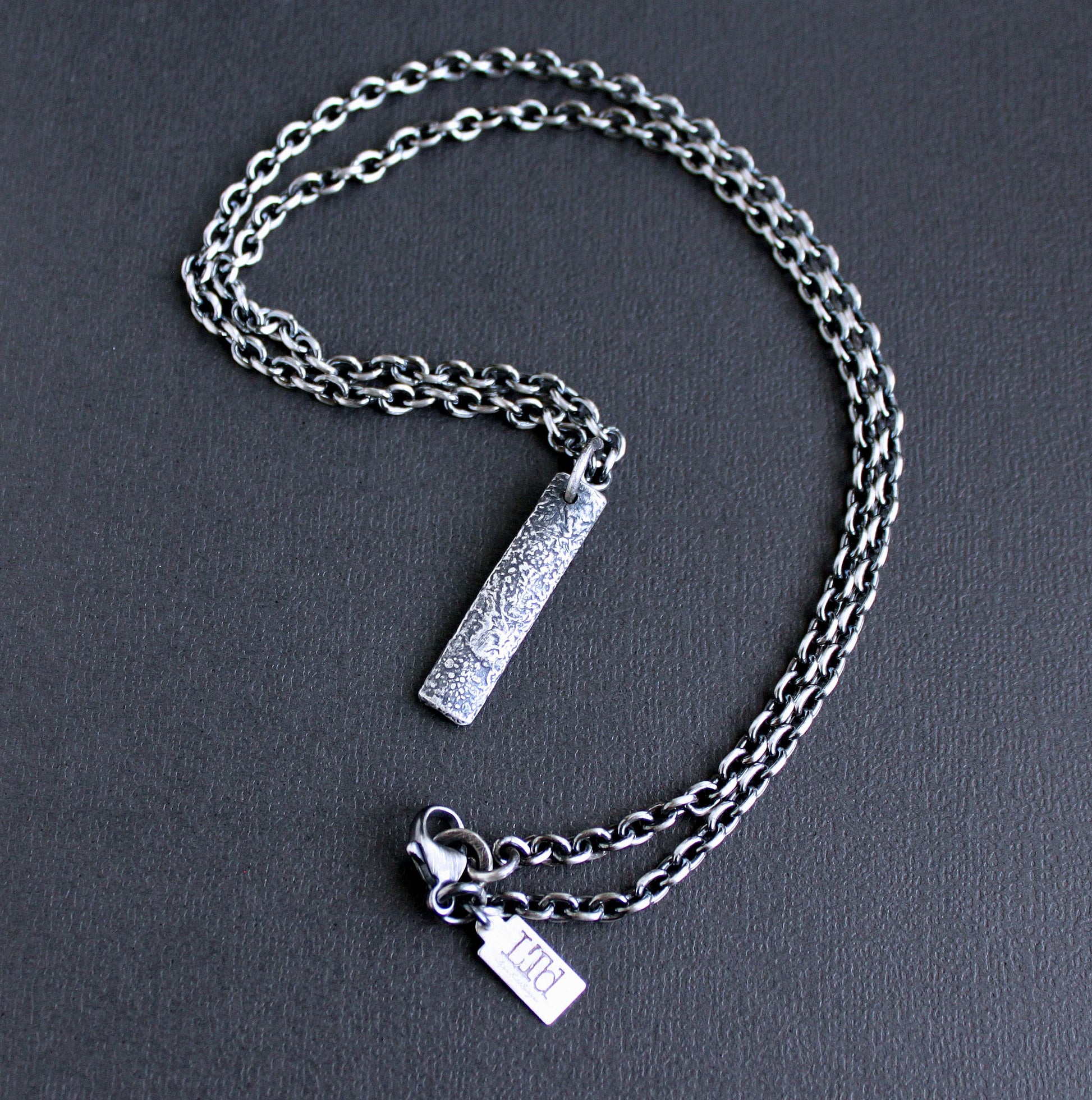reticulate silver pendant on chain